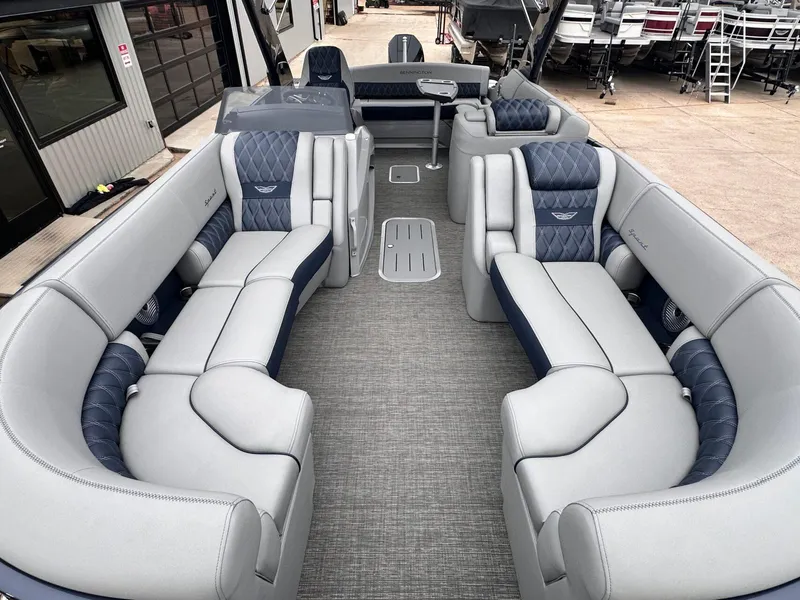 Slide: The Image of 2024 Bennington 23 RXSBA pontoon boat interior with luxurious seating and modern design. - 27