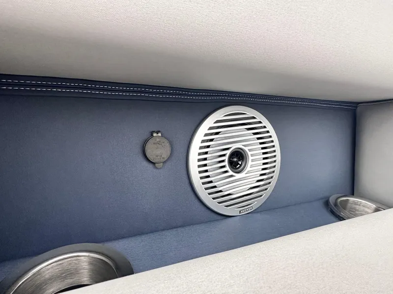 Slide: The Image of 2024 Bennington 23 RXSBA boat interior with speaker and cup holders. - 31