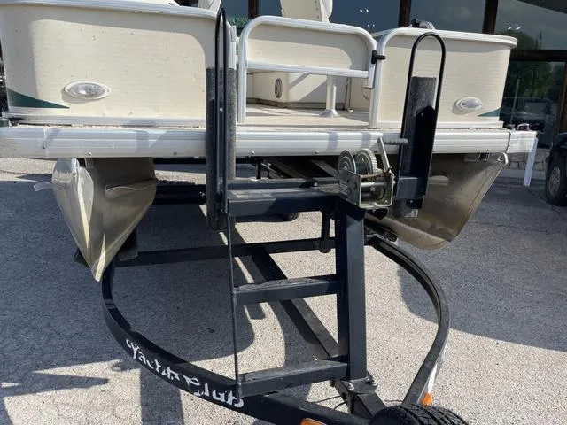 Slide: The Image of 2006 Godfrey Parti Kraft 1980F pontoon boat on a trailer. - 12