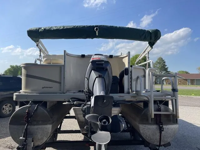Slide: The Image of 2006 Godfrey Parti Kraft 1980F pontoon boat with outboard motor, rear view. - 13