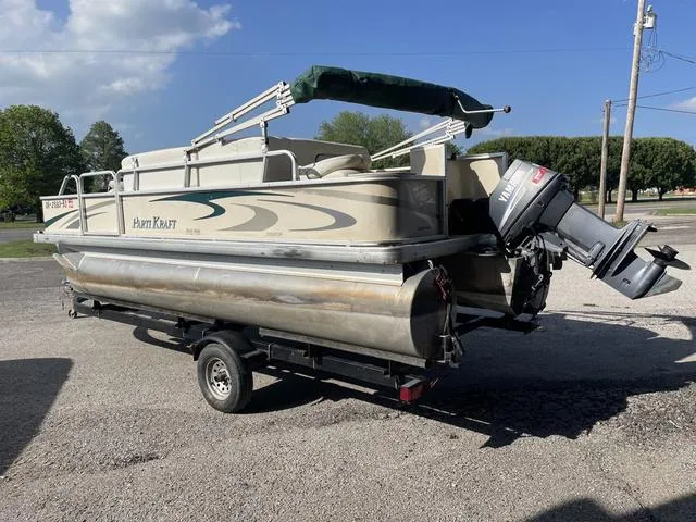 Slide: The Image of 2006 Godfrey Parti Kraft 1980F pontoon boat on trailer with outboard motor. - 4