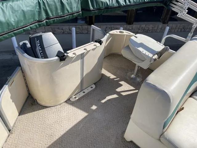 Slide: The Image of 2006 Godfrey Parti Kraft 1980F boat interior with Yamaha outboard motor. - 6