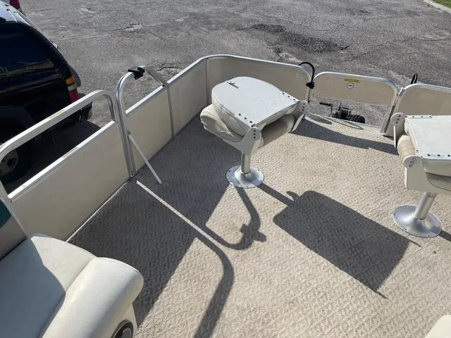 Slide: The Image of 2006 Godfrey Parti Kraft 1980F pontoon boat deck with swivel seats. - 9