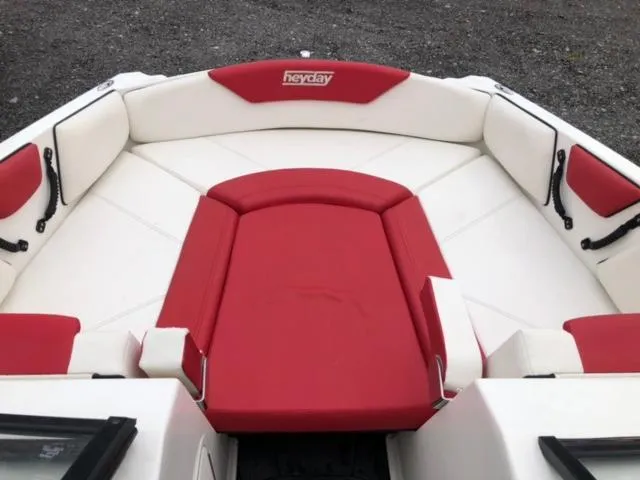 Slide: The Image of 2019 Heyday WTSurf boat with red and white seating. - 15
