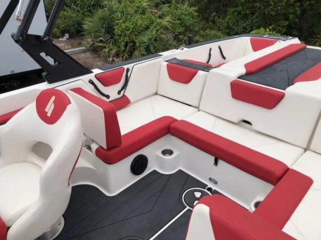 Slide: The Image of 2019 Heyday WTSurf boat interior with red and white seating. - 16