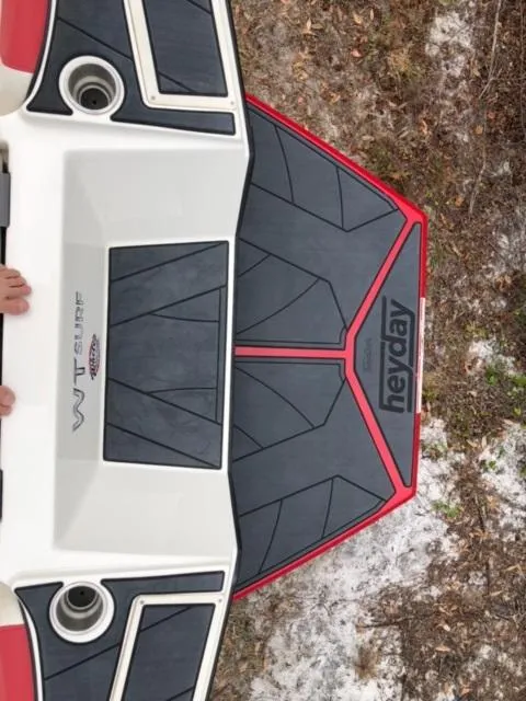 Slide: The Image of 2019 Heyday WTSurf boat deck with black and red traction pads. - 17