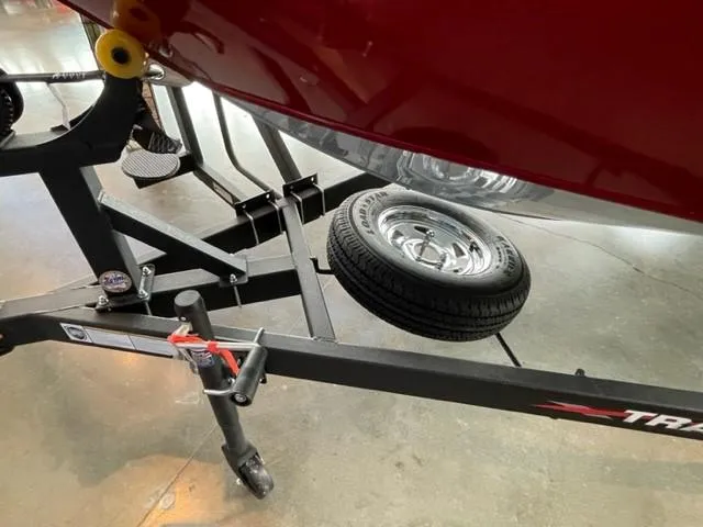 Slide: The Image of 2024 Tracker Targa V-19 WT boat trailer with spare tire. - 12