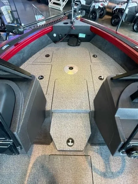 Slide: The Image of 2024 Tracker Targa V-19 WT boat interior with spacious deck and storage compartments. - 26