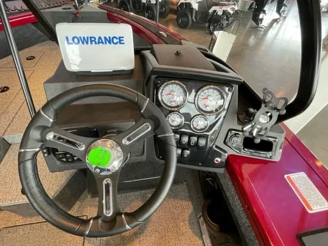 Slide: The Image of 2024 Tracker Targa V-19 WT boat dashboard with Lowrance electronics. - 4