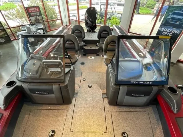 Slide: The Image of 2024 Tracker Targa V-19 WT boat interior with seating and windshield. - 8