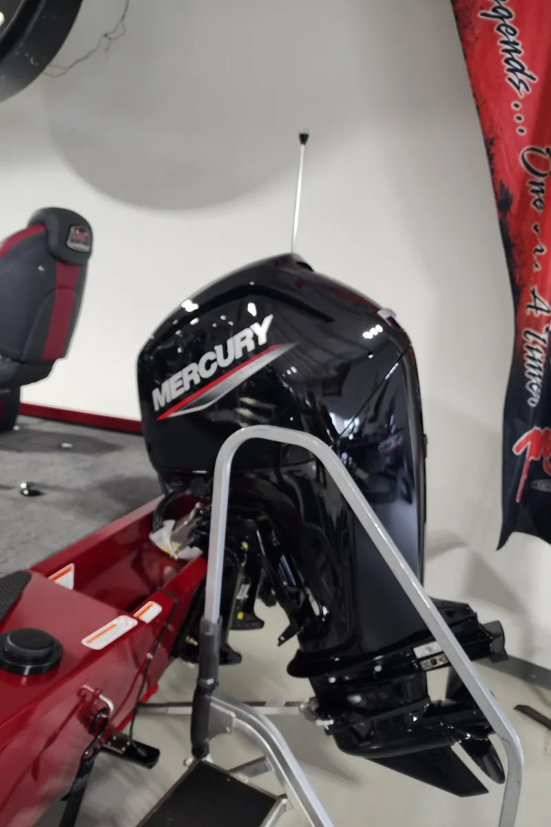 Slide: The Image of 2024 Ranger RT178 boat with Mercury outboard motor in showroom. - 10