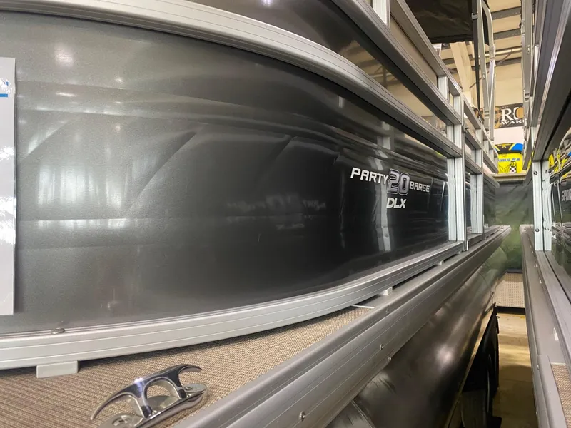 The Image of 2024 Sun Tracker Party Barge 20 DLX pontoon boat in showroom. - 0