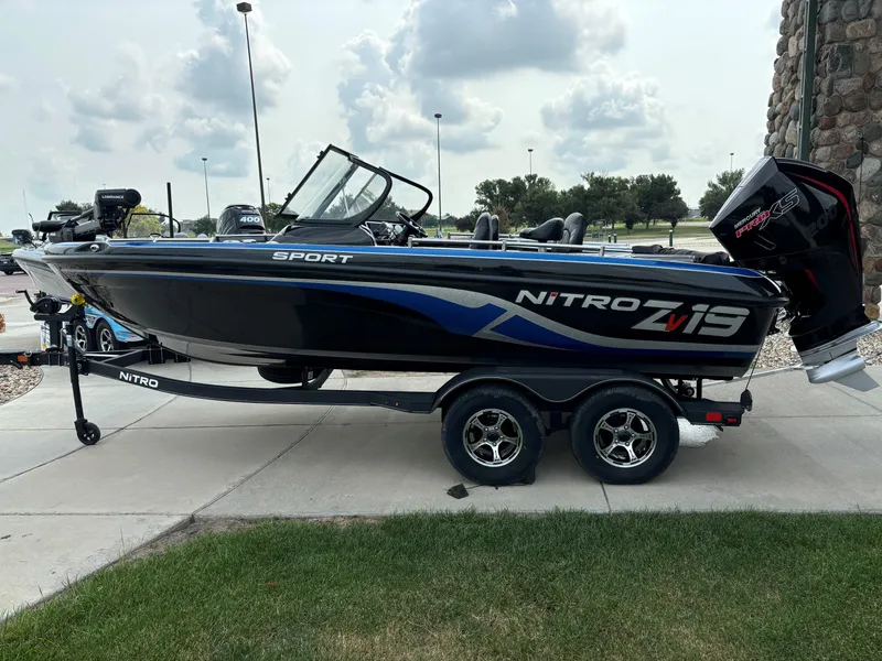 Slide: The Image of 2024 Nitro ZV19 Sport Pro boat on a trailer, side view. - 0