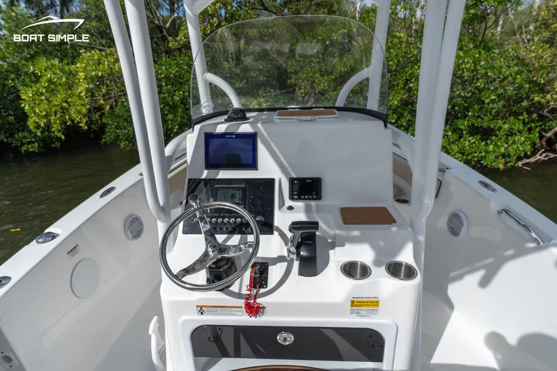 Slide: The Image of 2023 Sea Pro 219 Deep V CC center console with modern navigation equipment. - 3
