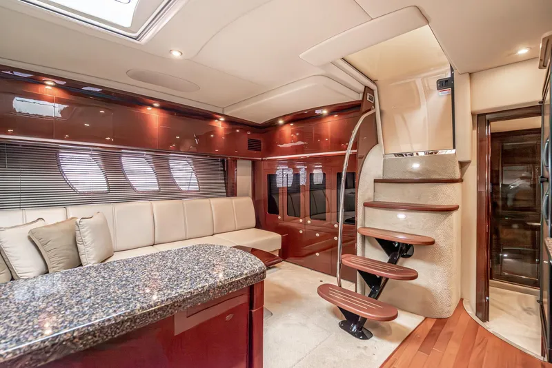 Slide: The Image of Luxurious interior of 2007 Sea Ray 48 Sundancer yacht with elegant seating and modern staircase. - 30