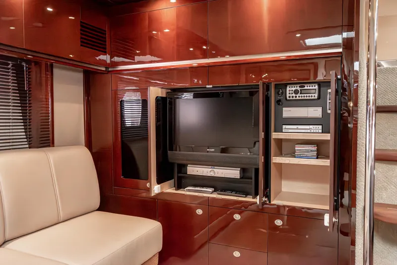 Slide: The Image of Luxurious interior of 2007 Sea Ray 48 Sundancer yacht with entertainment center. - 33