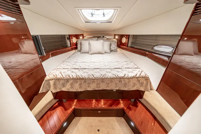 Slide: The Image of Luxurious cabin interior of 2007 Sea Ray 48 Sundancer yacht with elegant bedding. - 36