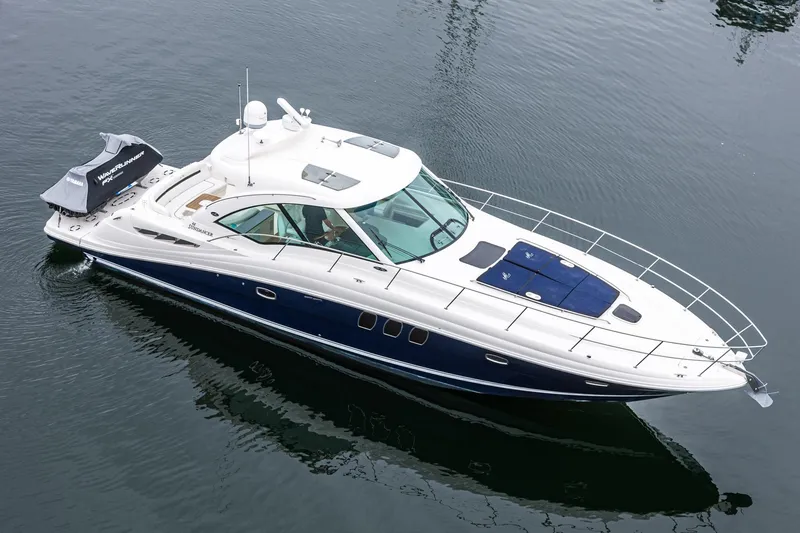 Slide: The Image of 2007 Sea Ray 48 Sundancer yacht on calm water, aerial view. - 5