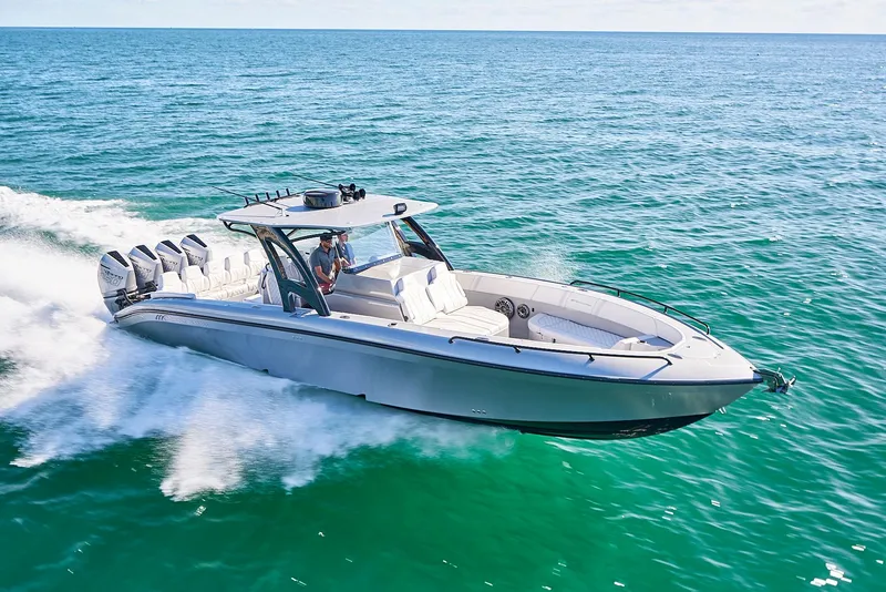 Slide: The Image of 2020 Midnight Express 37' Open boat cruising on the ocean. - 2