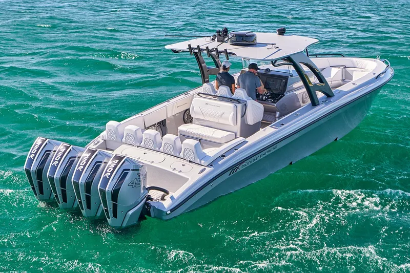 Slide: The Image of 2020 Midnight Express 37' Open boat cruising on turquoise waters. - 3