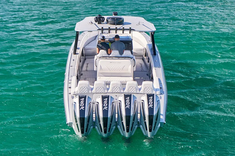 Slide: The Image of 2020 Midnight Express 37' Open boat with quad 450R engines on the water. - 4
