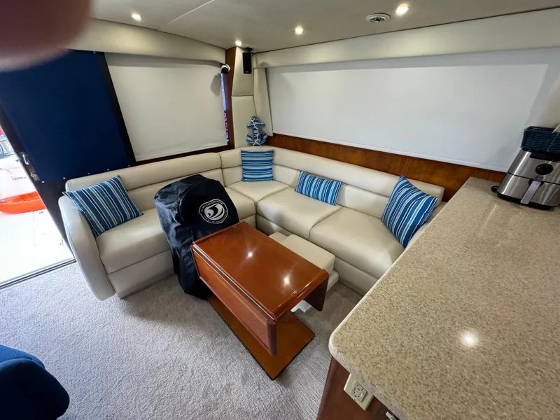 Slide: The Image of Luxurious interior of 2001 Ocean Yachts 48 with plush seating and modern decor. - 7