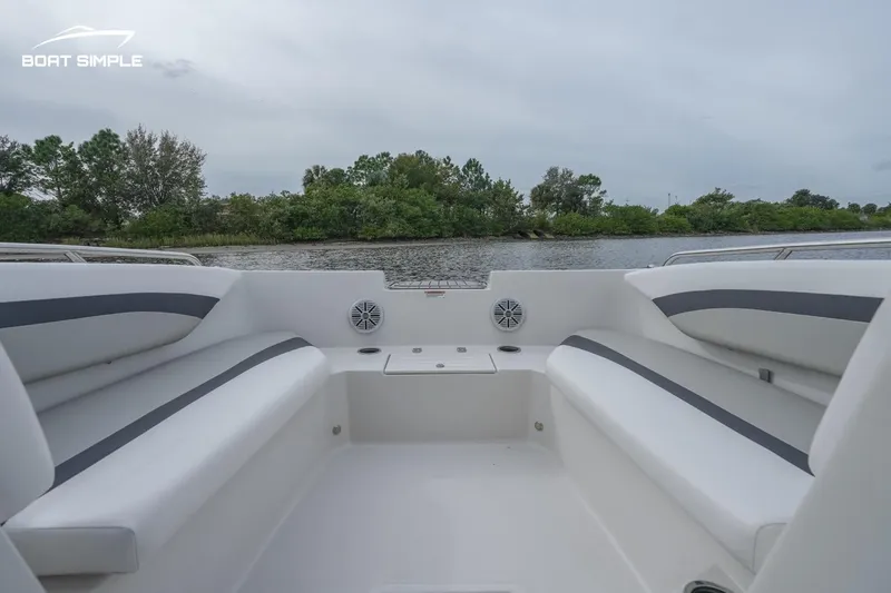 Slide: The Image of 2022 Starcraft SVX 171 OB boat interior with seating and water view. - 6