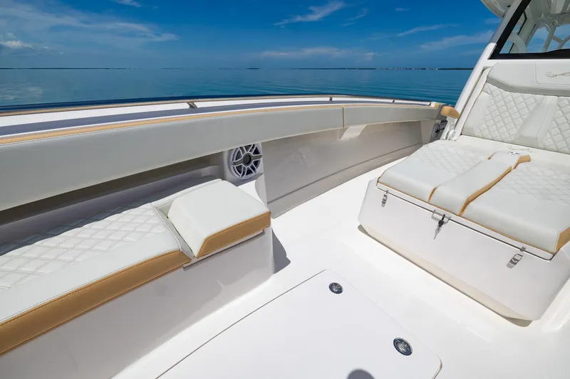 Slide: The Image of 2024 Blackwater 43 Sportfish boat interior with white and tan seating. - 13