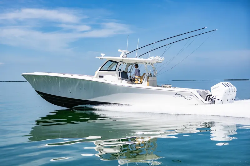 Slide: The Image of 2024 Blackwater 43 Sportfish boat cruising on calm waters. - 3