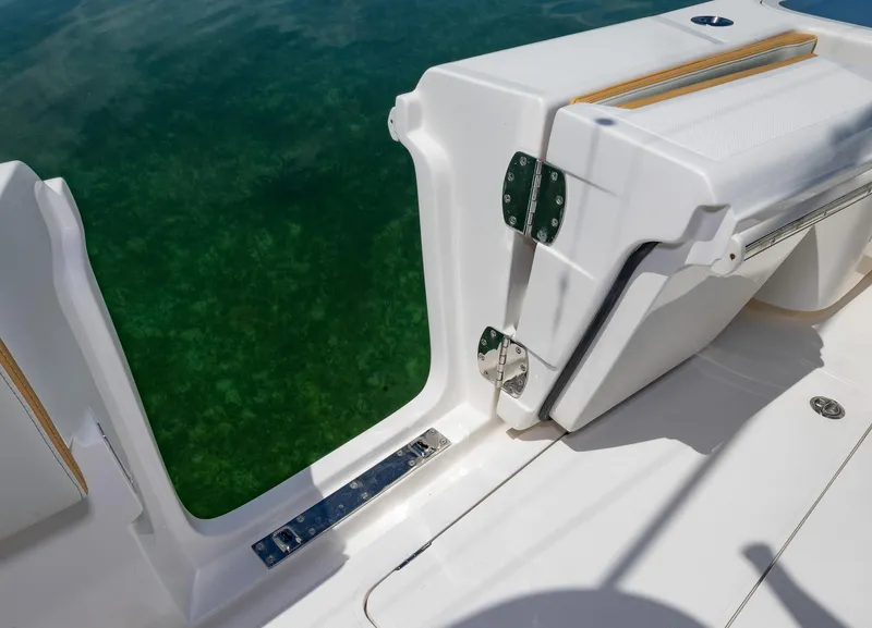 Slide: The Image of 2024 Blackwater 43 Sportfish boat with open side door and clear water view. - 33