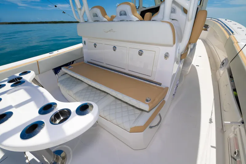 Slide: The Image of 2024 Blackwater 43 Sportfish boat interior with seating and rod holders. - 36