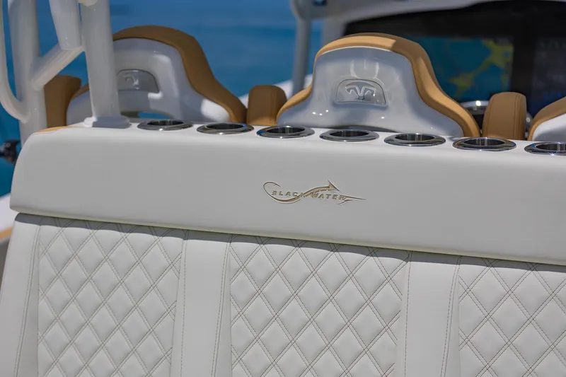Slide: The Image of 2024 Blackwater 43 Sportfish boat interior with diamond-stitched white leather seats. - 38