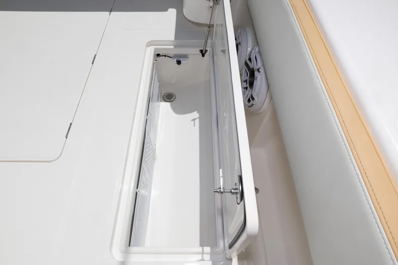 Slide: The Image of 2024 Blackwater 43 Sportfish open storage compartment on deck. - 49