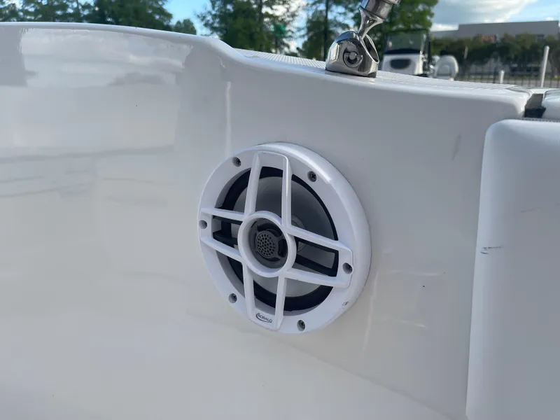 Slide: The Image of Close-up of a speaker on a 2021 Robalo R180 Center Console boat. - 22