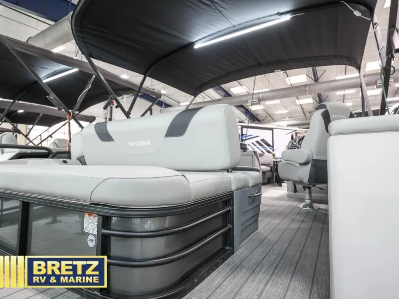 Slide: The Image of 2024 L3 CLZ DH pontoon boat interior at Bretz RV & Marine showroom. - 10