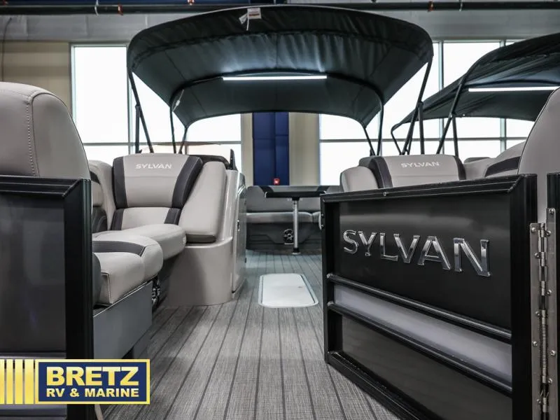 Slide: The Image of 2024 L3 CLZ DH pontoon boat interior with Sylvan branding, showcased by Bretz RV & Marine. - 11
