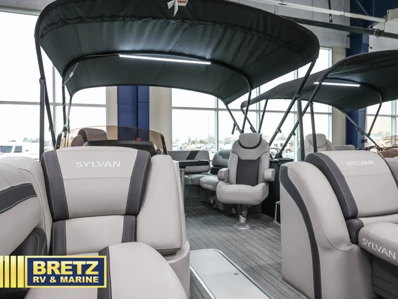 Slide: The Image of 2024 L3 CLZ DH pontoon boat interior with Sylvan seating at Bretz RV & Marine showroom. - 12