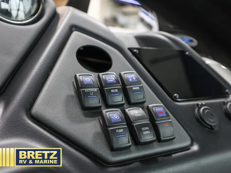 Slide: The Image of Control panel of 2024 L3 CLZ DH boat with labeled switches, Bretz RV & Marine logo. - 15