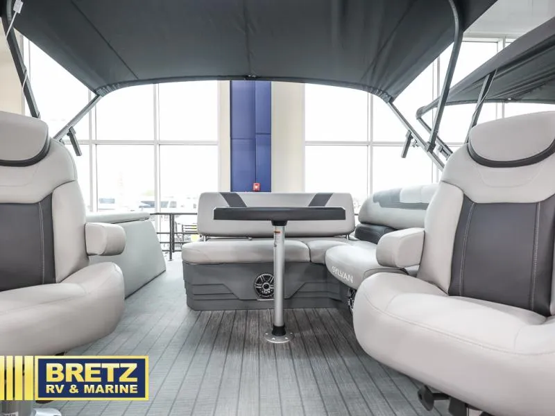 Slide: The Image of 2024 L3 CLZ DH boat interior with plush seating and table, showcased by Bretz RV & Marine. - 17