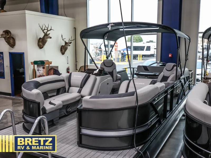 Slide: The Image of 2024 L3 CLZ DH pontoon boat displayed at Bretz RV & Marine showroom. - 3