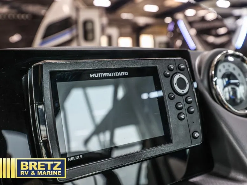 Slide: The Image of 2024 L-5 DLZ DH BAR dashboard with Humminbird Helix 5 display at Bretz RV & Marine. - 10