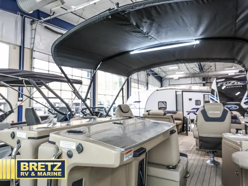 Slide: The Image of 2024 L-5 DLZ DH BAR boat interior at Bretz RV & Marine showroom. - 12