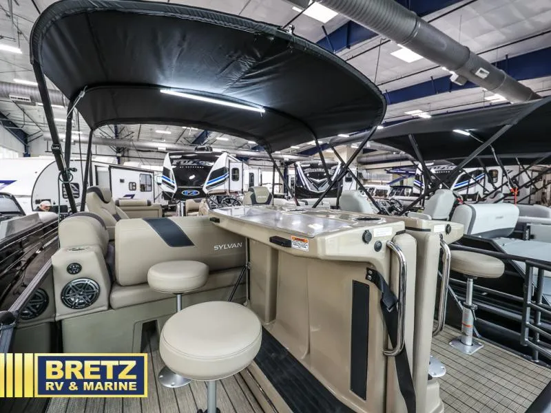 Slide: The Image of 2024 L-5 DLZ DH BAR boat interior at Bretz RV & Marine showroom. - 13
