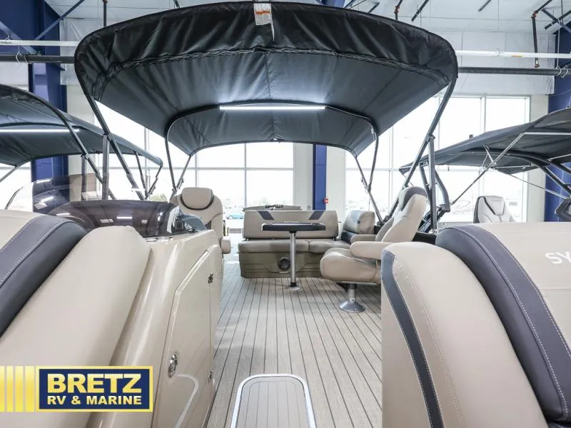 Slide: The Image of 2024 L-5 DLZ DH BAR boat interior with seating and canopy at Bretz RV & Marine. - 4