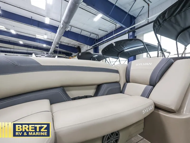 Slide: The Image of Luxurious Sylvan boat seating in showroom, featuring 2024 L-5 DLZ DH BAR model. - 5