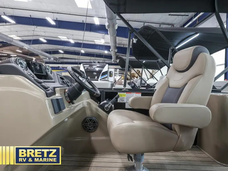 Slide: The Image of 2024 L-5 DLZ DH BAR boat interior with steering wheel and captain's chair at Bretz RV & Marine. - 6