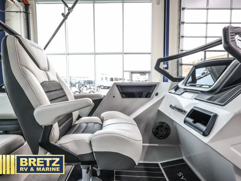 Slide: The Image of 2024 G3 CLZ DC boat interior with modern helm and comfortable seating. - 12