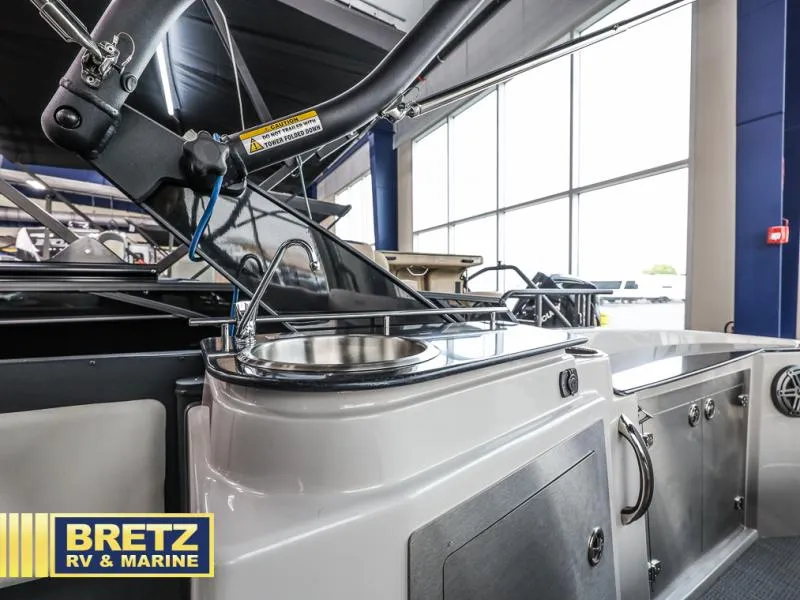 Slide: The Image of 2024 G3 CLZ DC boat interior with sink and storage at Bretz RV & Marine showroom. - 17