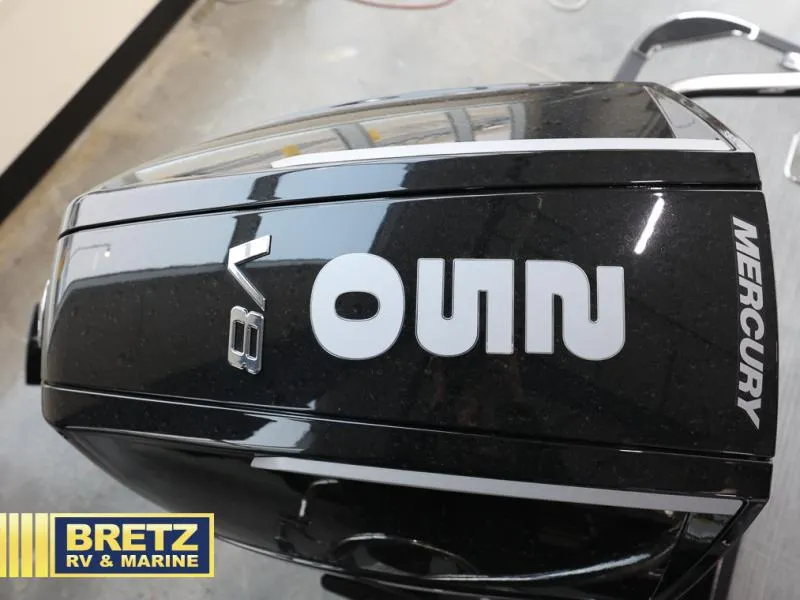 Slide: The Image of 2024 Mercury V8 outboard motor at Bretz RV & Marine showroom. - 6