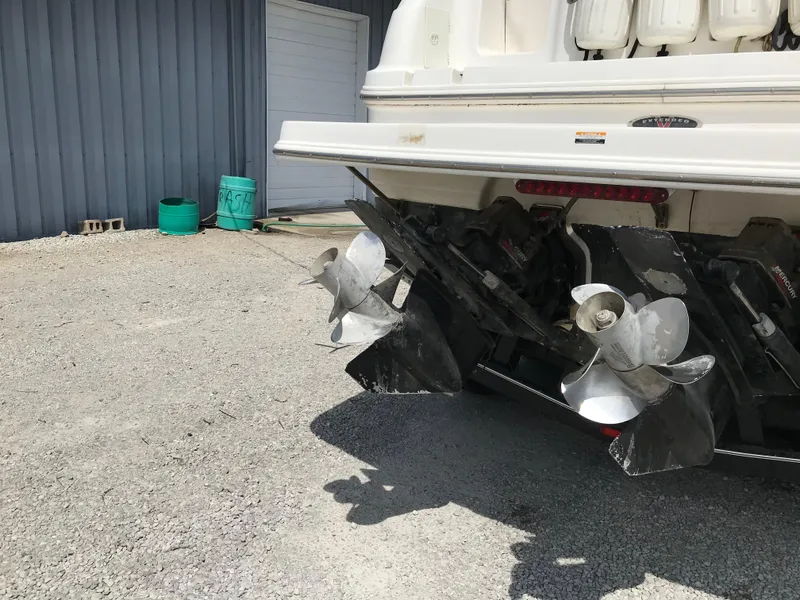 Slide: The Image of Rear view of 2002 Chaparral Signature 300 boat with dual propellers. - 16